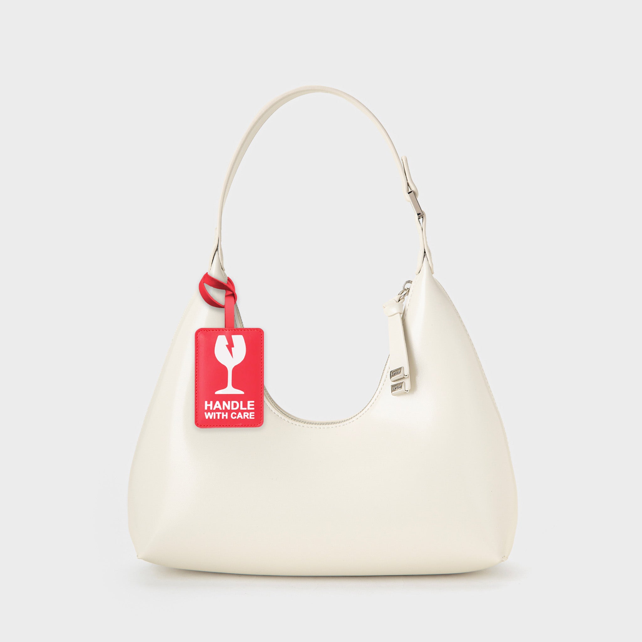 HANDLE WITH CARE BAG CHARM