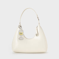 CHEERFUL CHAMPAGNE BAG CHARM