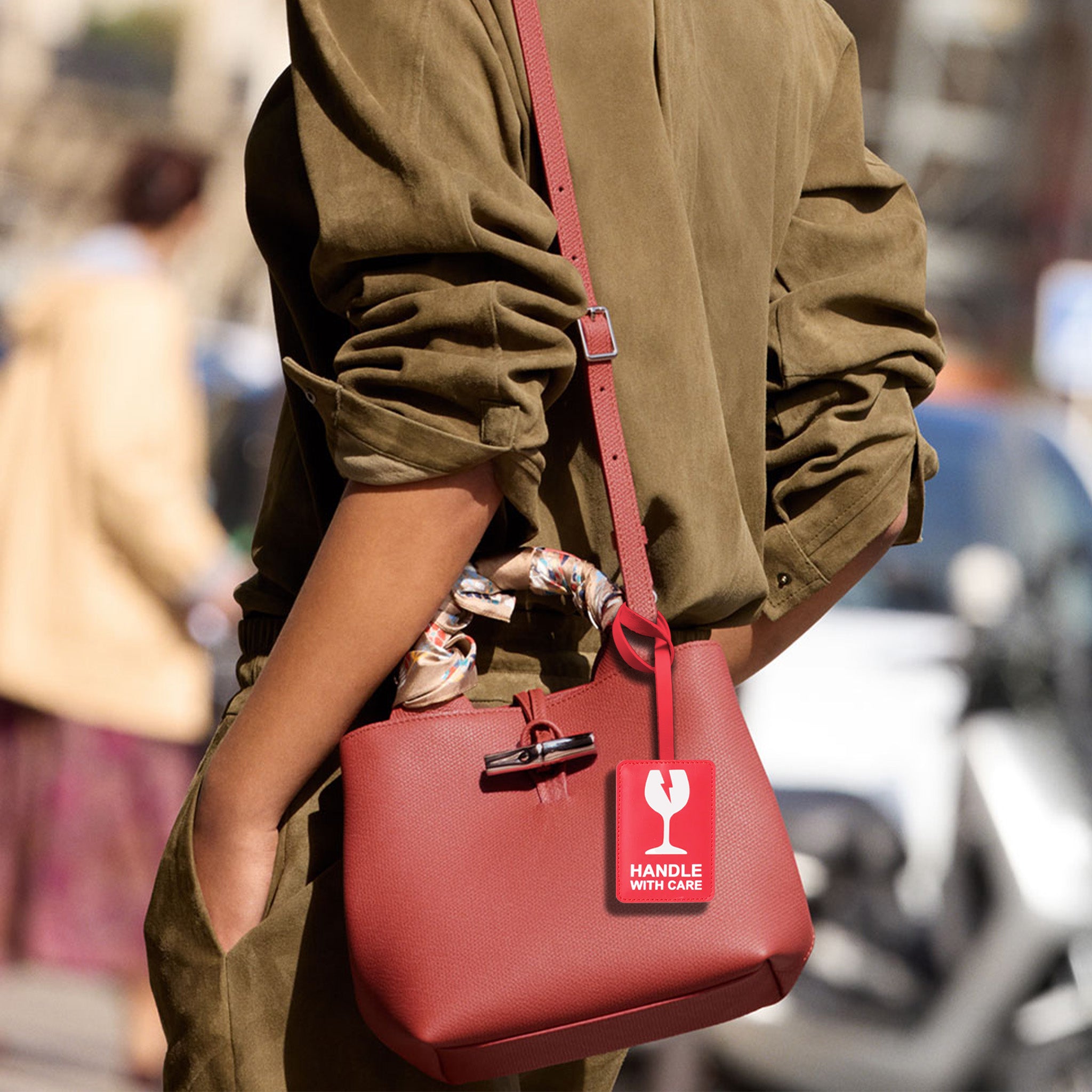 HANDLE WITH CARE BAG CHARM