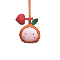 ORANGE BAG CHARM